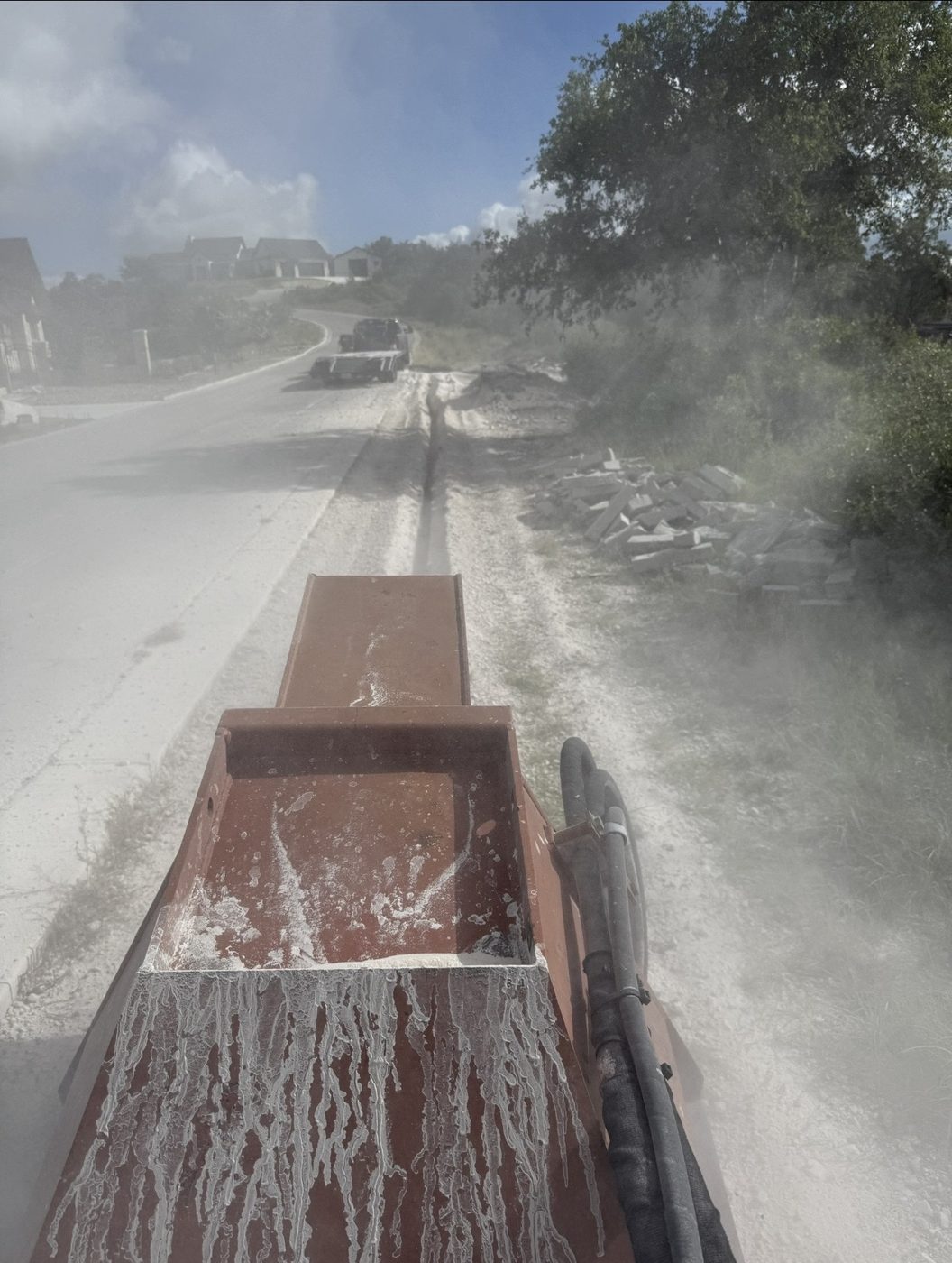 Rock trenching along roadway